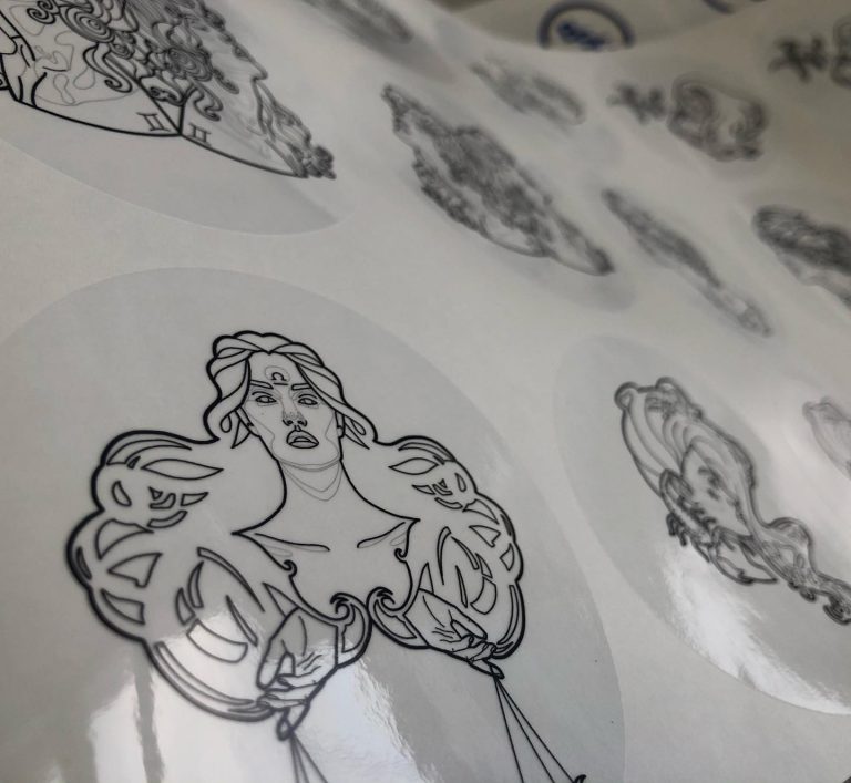 Custom clear glossy vinyl sticker with monochromatic lady portrait – transparent branded label