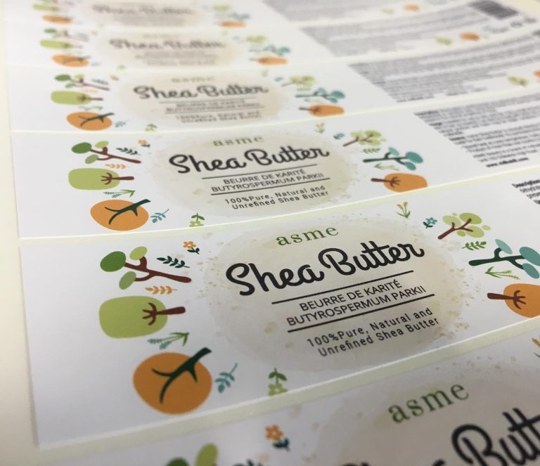 Custom glossy vinyl body cream labels in purple and gold branding – waterproof high-shine stickers