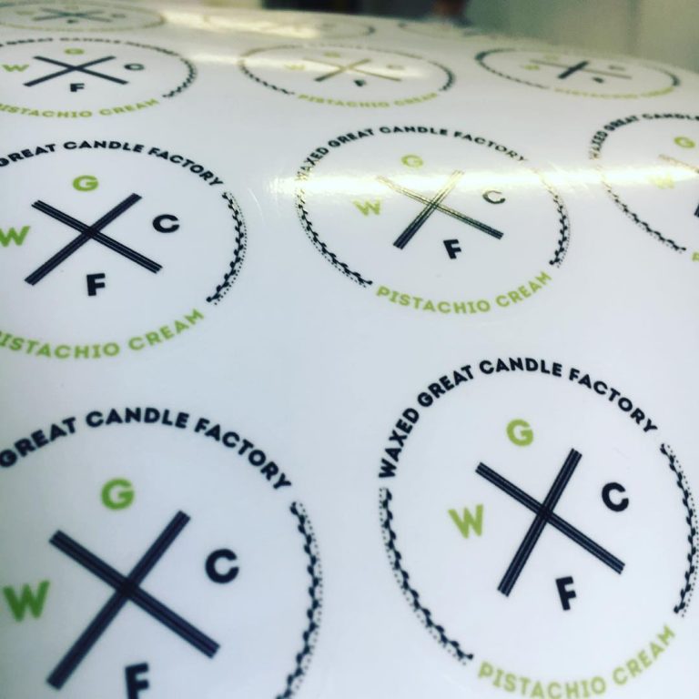 Custom clear glossy vinyl sticker on candle jar – transparent waterproof label