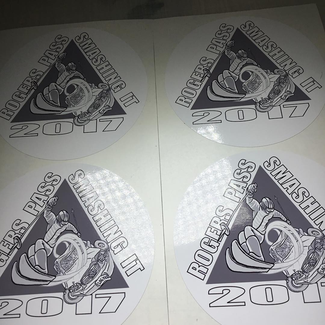 Custom round glossy vinyl sticker with monochromatic branded logo – transparent waterproof label