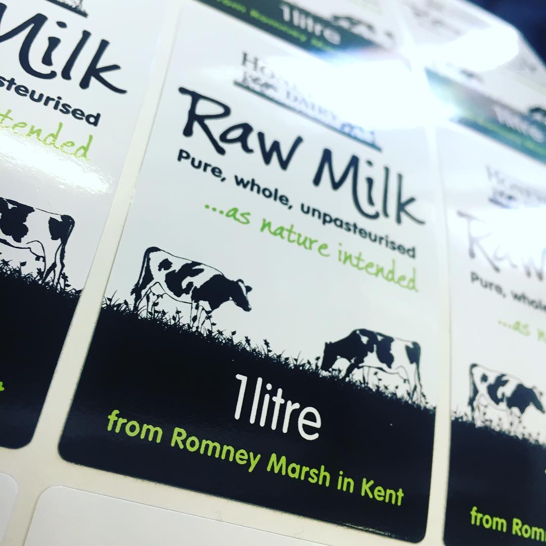 Custom high tack glossy vinyl raw milk labels – branded with logo and cow graphics